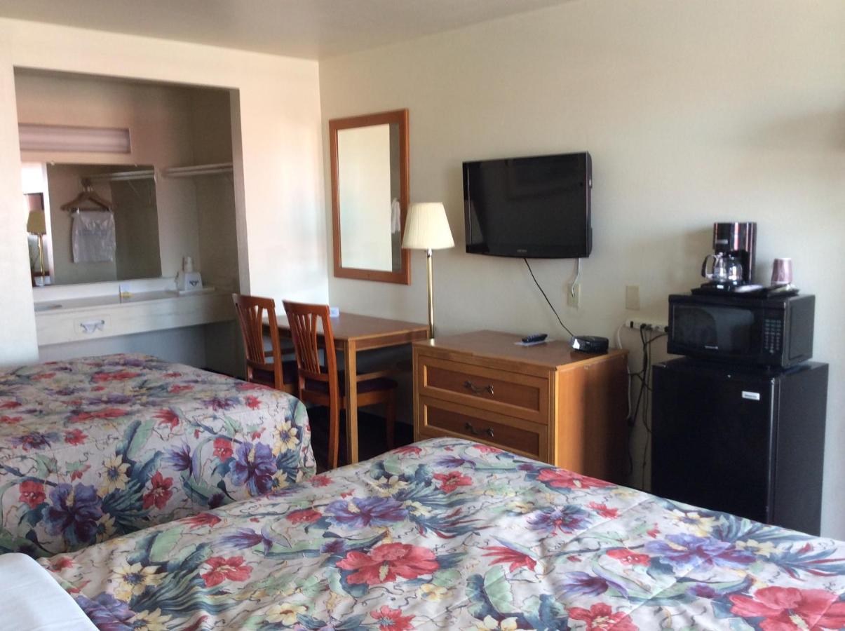 Queen Room with Two Queen Beds - Smoking at Days Inn by Wyndham in San Bernardino
