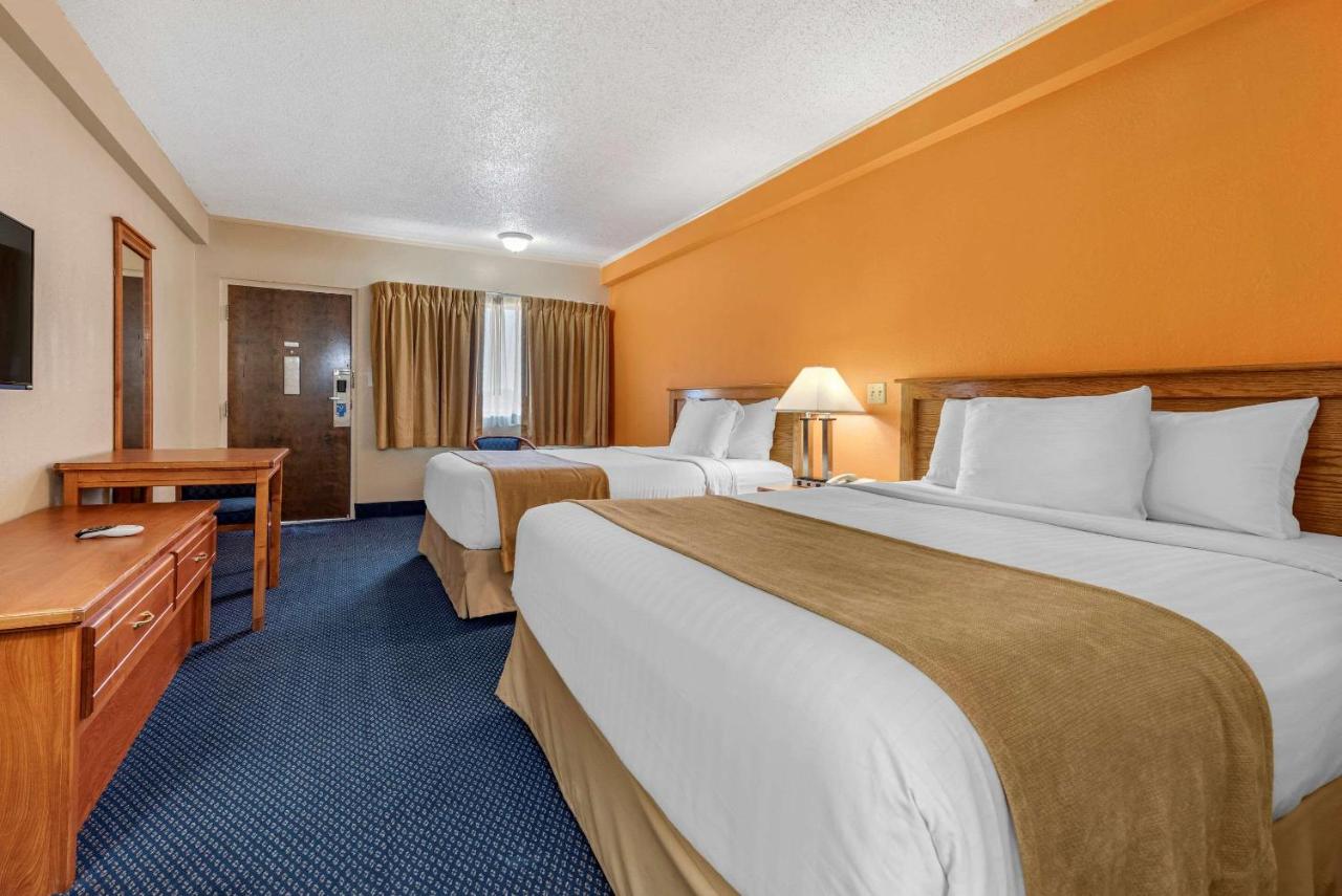 Queen Room with Two Queen Beds - Non-Smoking at Asam Hotel