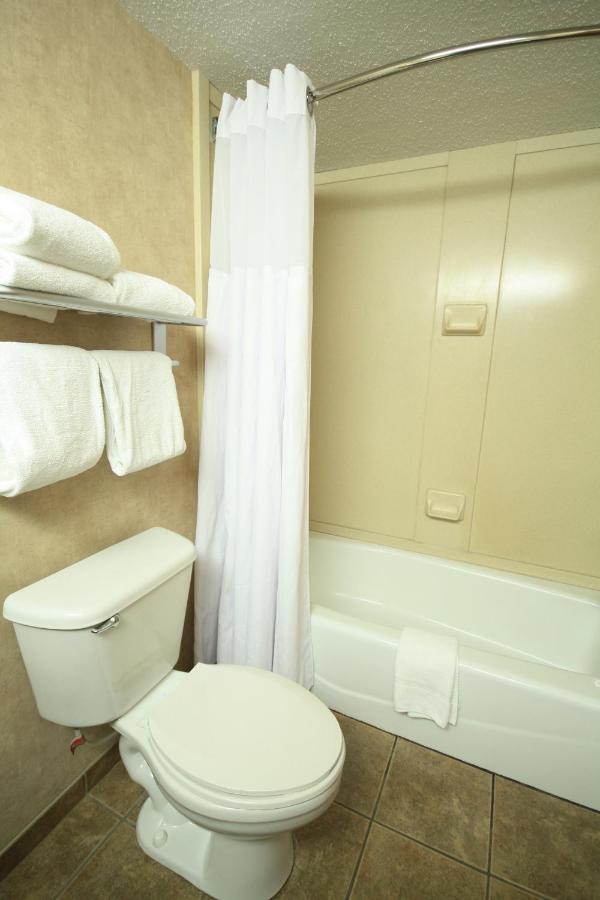 One-Bedroom King Suite - Non-Smoking at Ramada by Wyndham Sioux Falls Airport - Waterpark Resort & Event Center