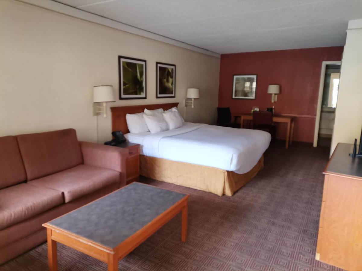 Two Bedroom Suite with One King and Two Queen Beds at Super 8 by Wyndham San Antonio Near SeaWorld Ingram Park
