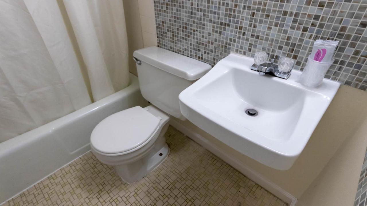 Double Room with Two King Beds with Balcony - Street View at Rideau Oceanfront Motel