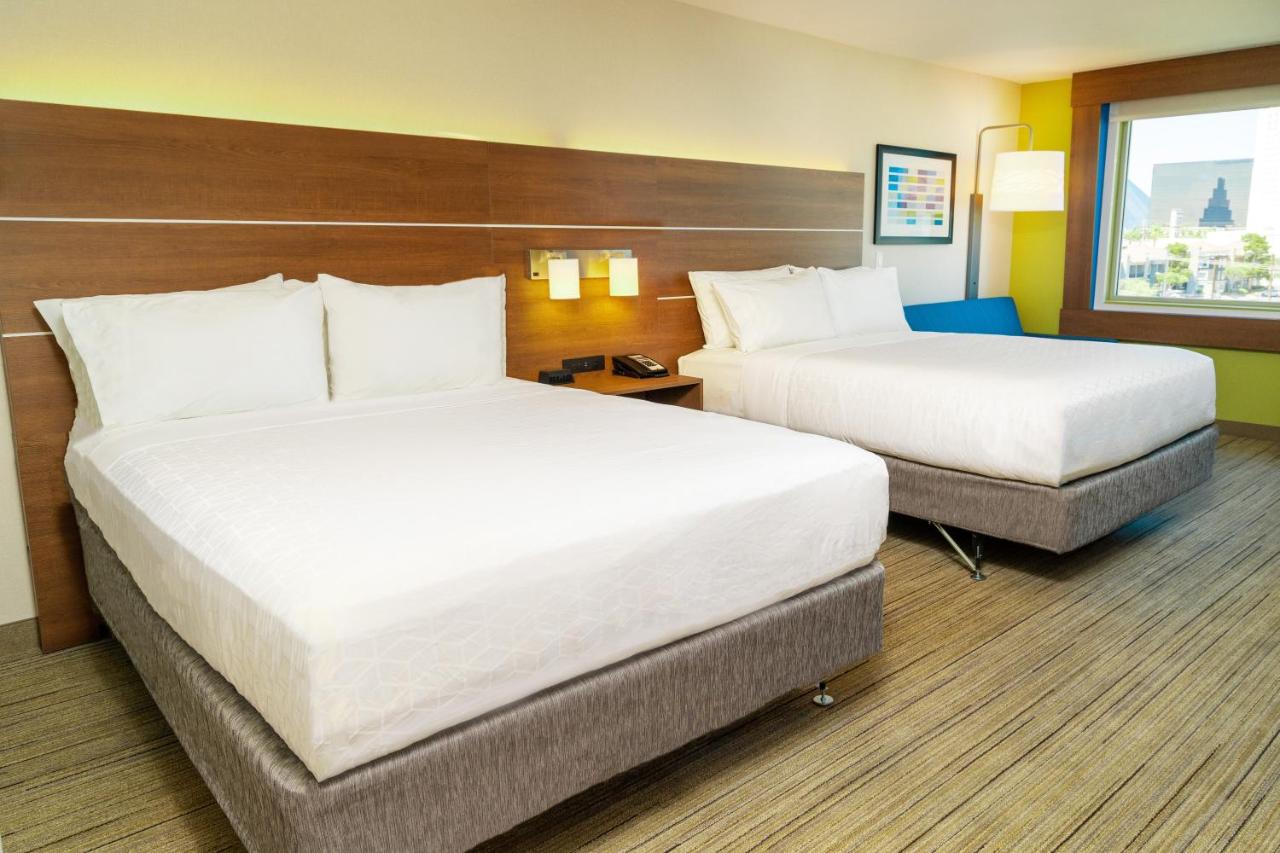 Double Room with Two Queen Beds and Mobility Accessible Tub - Non-Smoking at Holiday Inn Express & Suites Las Vegas - E Tropicana, an IHG Hotel