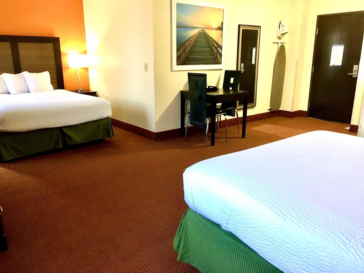Queen Room with Two Queen Beds - Mobility Access/Non-Smoking at Days Inn & Suites by Wyndham Traverse City