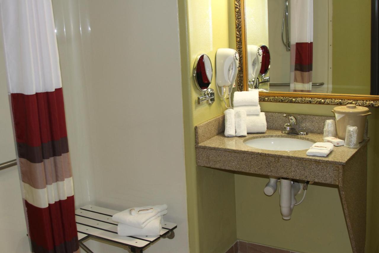 Deluxe Room with Two Queen Beds Disability Access Roll-In Shower Non-Smoking at Red Roof Inn & Suites Detroit-Melvindale/ Dearborn