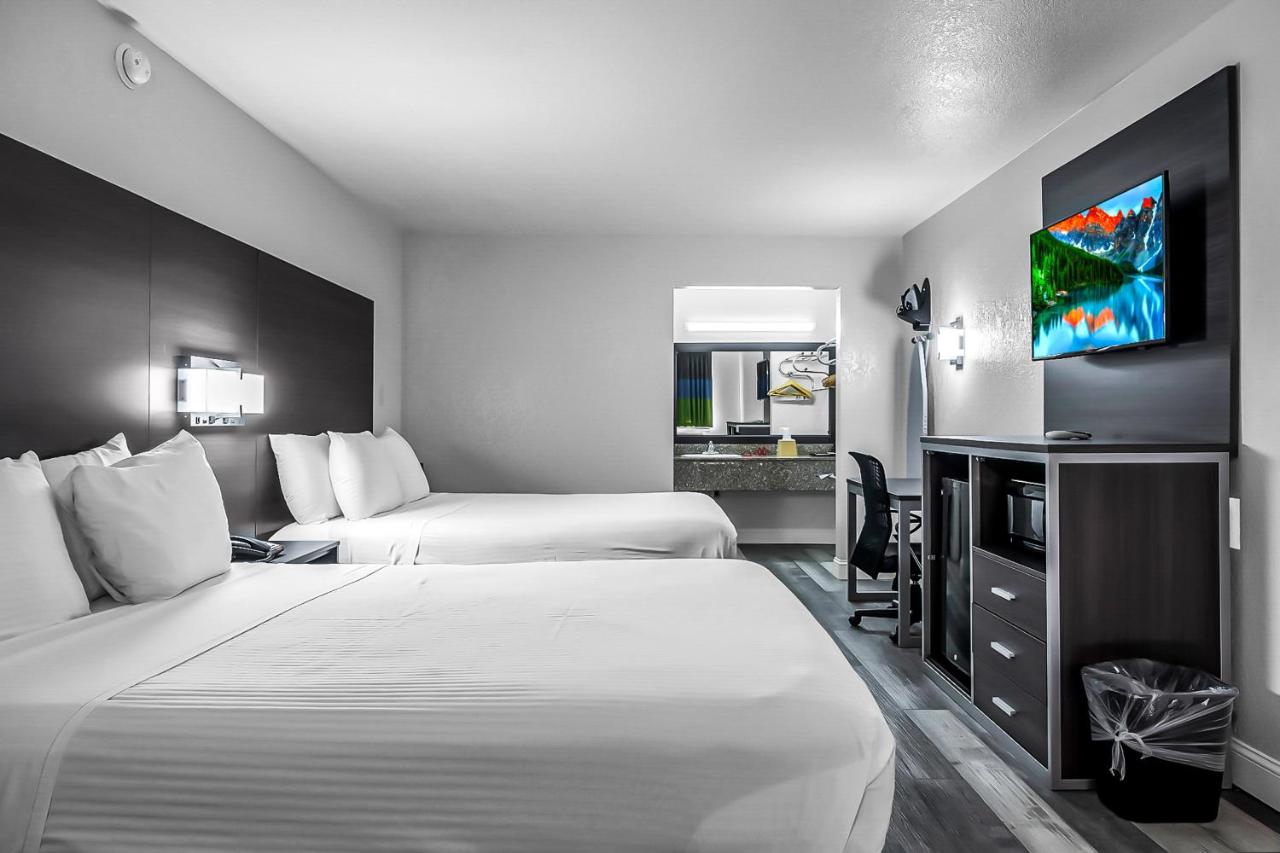 Queen Room with Two Queen Beds at SureStay Hotel by Best Western Oklahoma City West