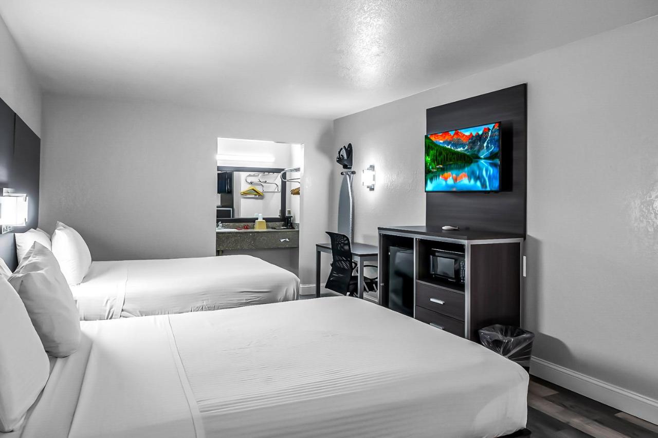 Queen Room with Two Queen Beds at SureStay Hotel by Best Western Oklahoma City West
