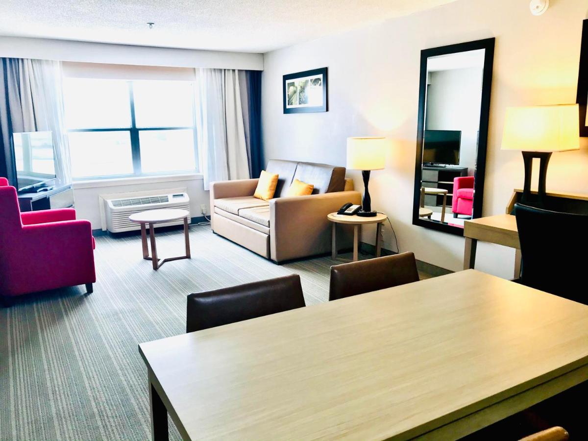 King Room with Sofa Bed at Country Inn & Suites by Radisson, Warner Robins, GA