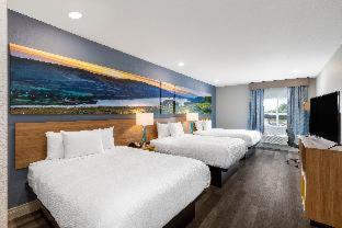 Room #586445606 at Days Inn & Suites by Wyndham Downtown/University of Houston