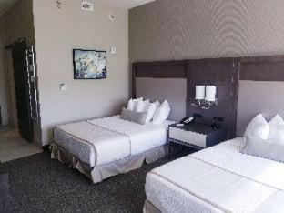 Room #638031924 at Best Western Plus Executive Residency Rigby's Water World Hotel