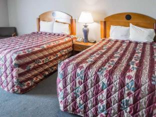Room #49000109 at Days Inn & Suites by Wyndham Merrillville