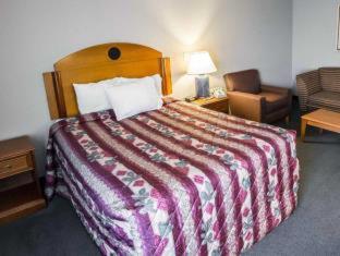 Room #49000112 at Days Inn & Suites by Wyndham Merrillville