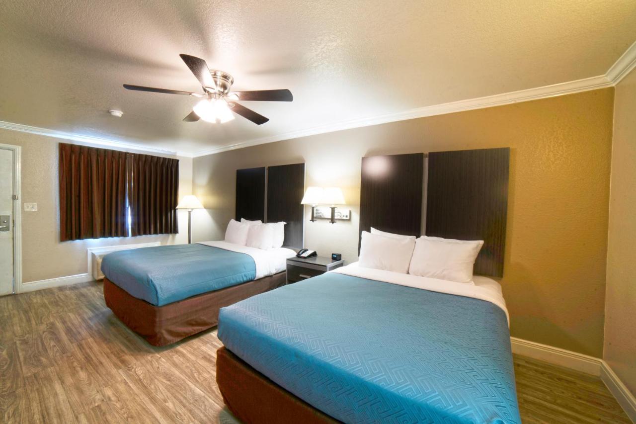 Queen Room with Two Queen Beds - Accessible/Non-Smoking at Econo Lodge Inn & Suites Corpus Christi