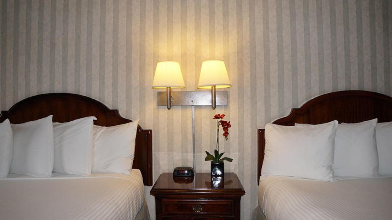 Queen Room with Two Queen Beds (No Pets) at Emerald Dolphin Inn & Mini Golf