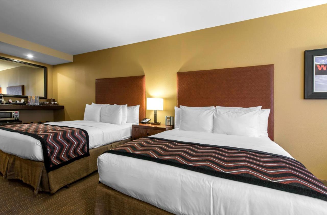 Deluxe Queen Room with Two Queen Beds at The Golden Hotel, an Ascend Collection Hotel