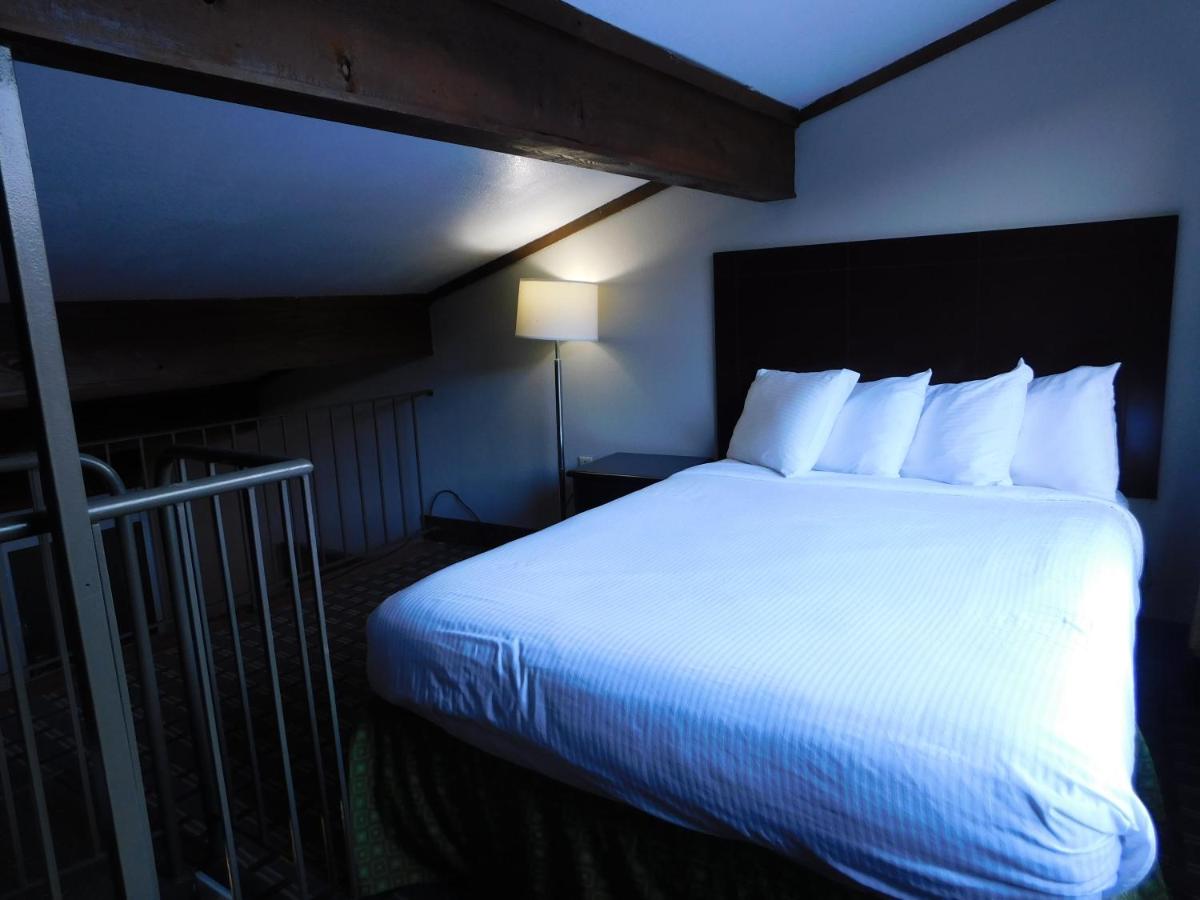 1 King Bed and 1 Queen Bed, Loft Suite, Non-Smoking at Days Inn & Suites by Wyndham Downtown Gatlinburg Parkway