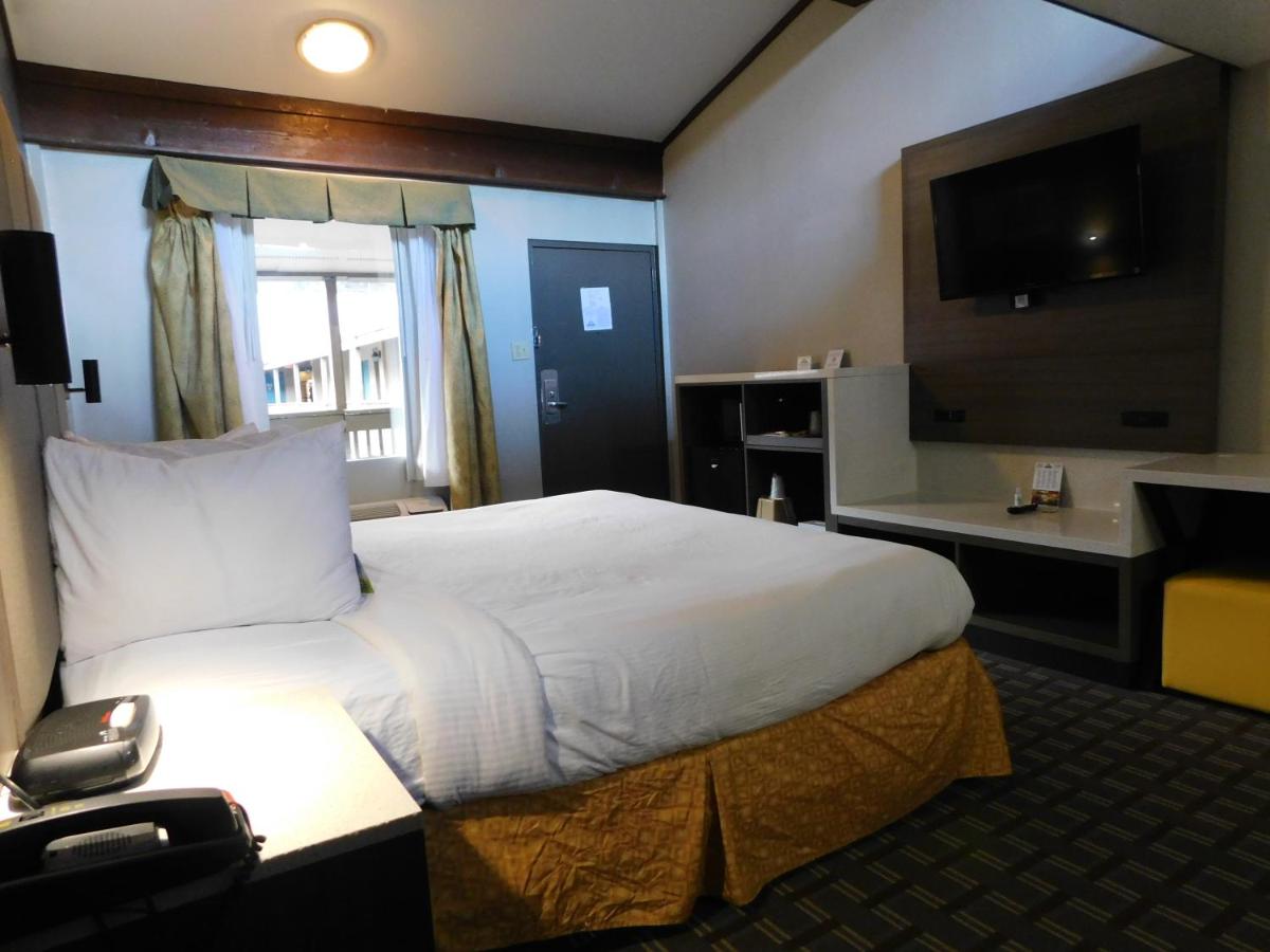 1 King Bed and 1 Queen Bed, Loft Suite, Non-Smoking at Days Inn & Suites by Wyndham Downtown Gatlinburg Parkway