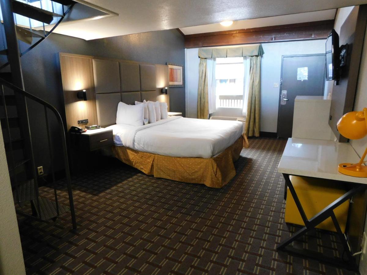 1 King Bed and 1 Queen Bed, Loft Suite, Non-Smoking at Days Inn & Suites by Wyndham Downtown Gatlinburg Parkway