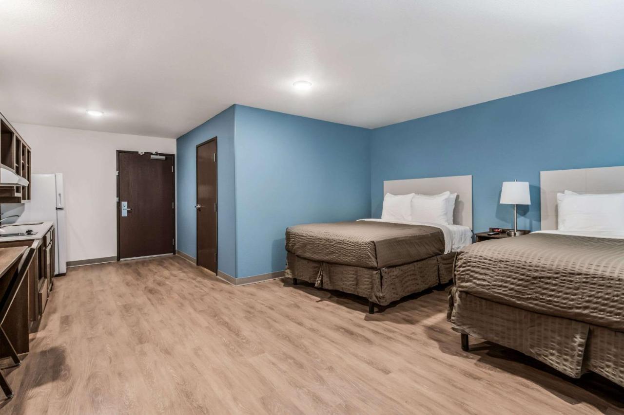 Queen Room with Two Queen Beds and Tub - Accessible/Non-Smoking at WoodSpring Suites Charlotte - University Research Park