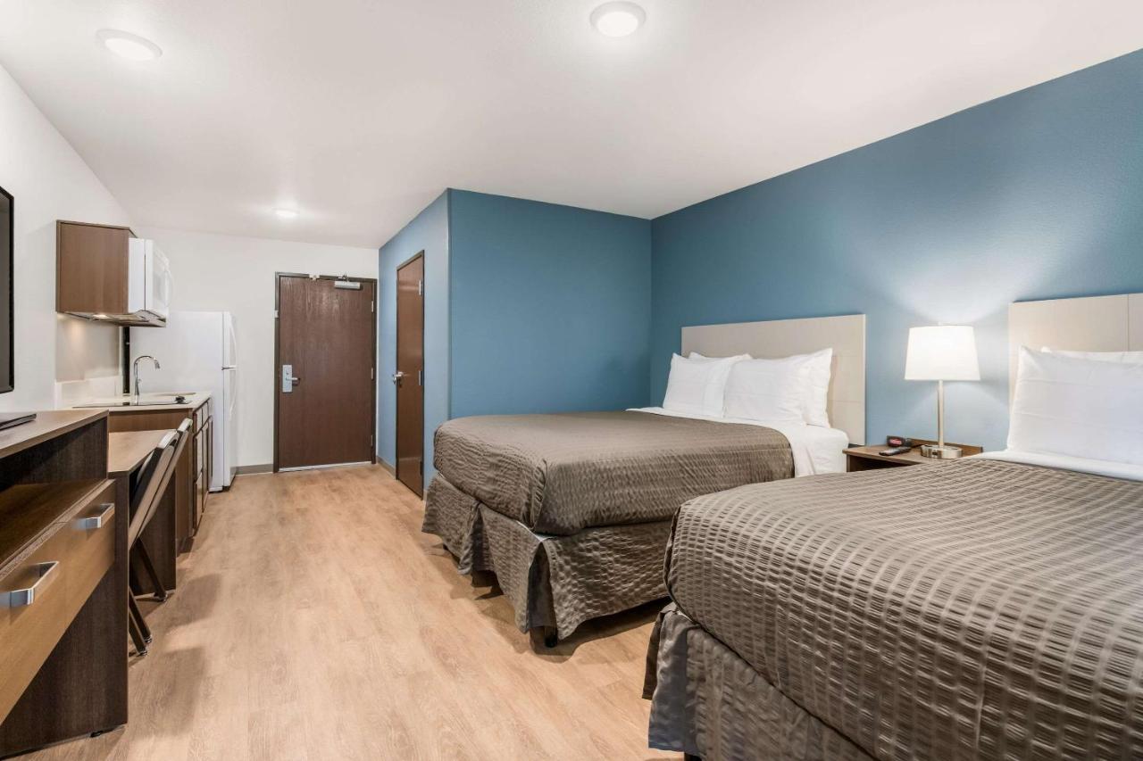 Standard Queen Room with Two Queen Beds - Non-Smoking at WoodSpring Suites Charlotte - University Research Park