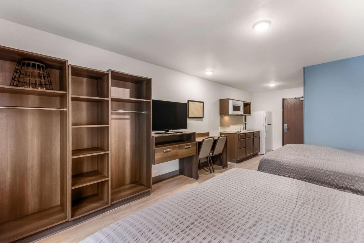 Standard Queen Room with Two Queen Beds - Non-Smoking at WoodSpring Suites Charlotte - University Research Park