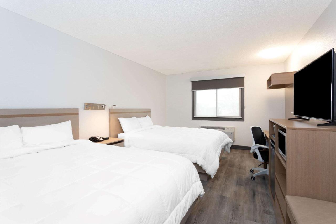 Queen Room with Two Queen Beds - Non-Smoking at Travelodge by Wyndham Elkhart