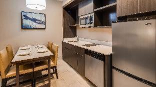 Room #638031936 at Best Western Plus Executive Residency Rigby's Water World Hotel