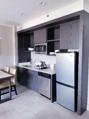 Room #638031936 at Best Western Plus Executive Residency Rigby's Water World Hotel