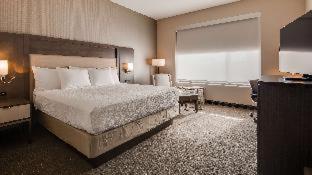 Room #638031937 at Best Western Plus Executive Residency Rigby's Water World Hotel
