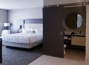 Room #638031937 at Best Western Plus Executive Residency Rigby's Water World Hotel