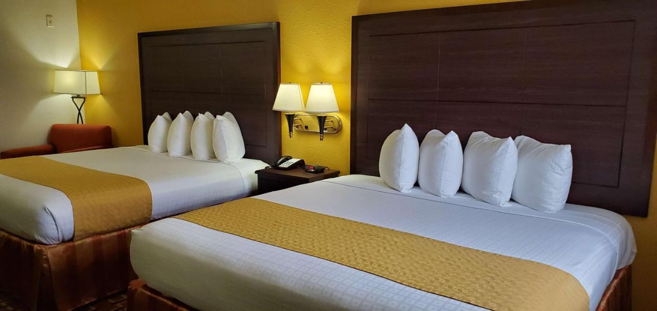 King Room with Two King Beds at Best Western Executive Inn & Suites