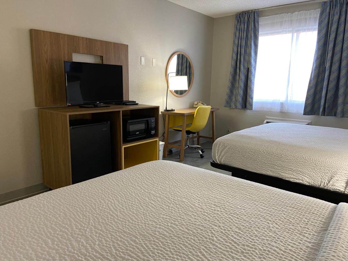 Queen Room with Two Queen Beds - Non-Smoking at Days Inn by Wyndham Rawlins