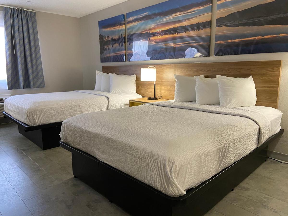 Queen Room with Two Queen Beds - Non-Smoking at Days Inn by Wyndham Rawlins