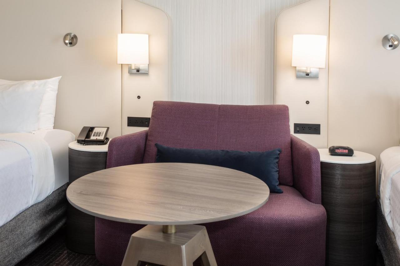 Queen Room with Two Queen Beds at Crowne Plaza Kansas City Downtown, an IHG Hotel