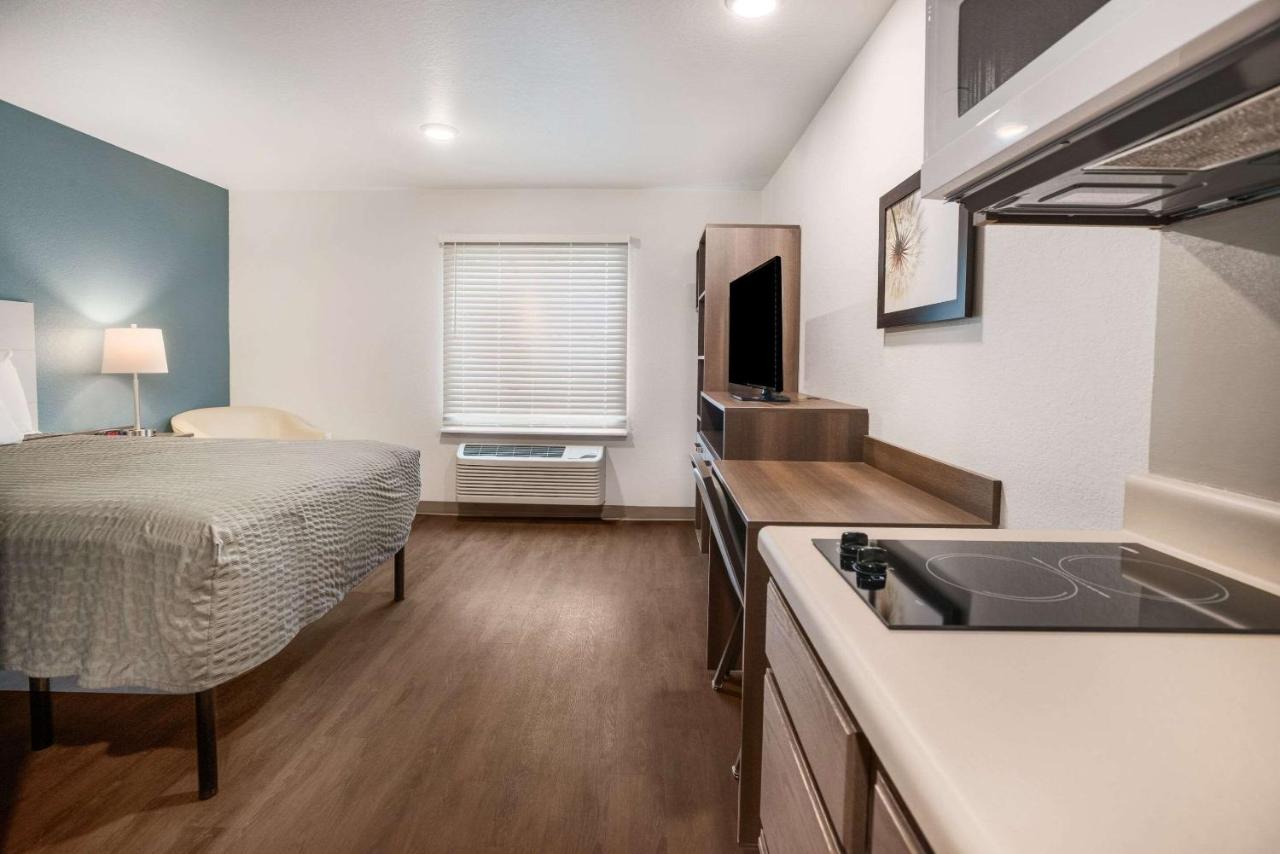 Queen Room with Roll-In Shower - Accessible/Non-Smoking at WoodSpring Suites Sulphur - Lake Charles