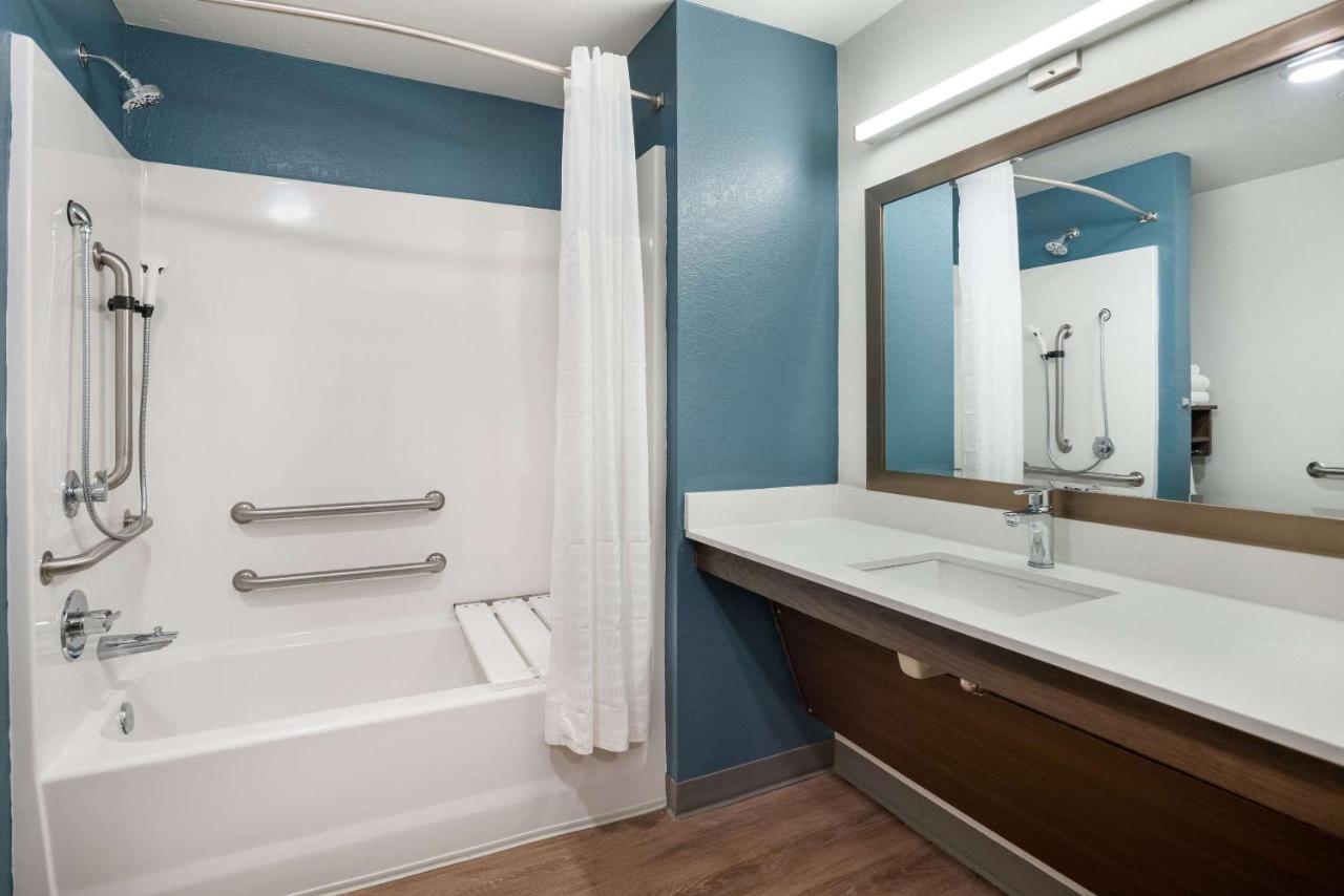 Queen Room with Two Queen Beds and Tub - Accessible/Non-Smoking at WoodSpring Suites Sulphur - Lake Charles