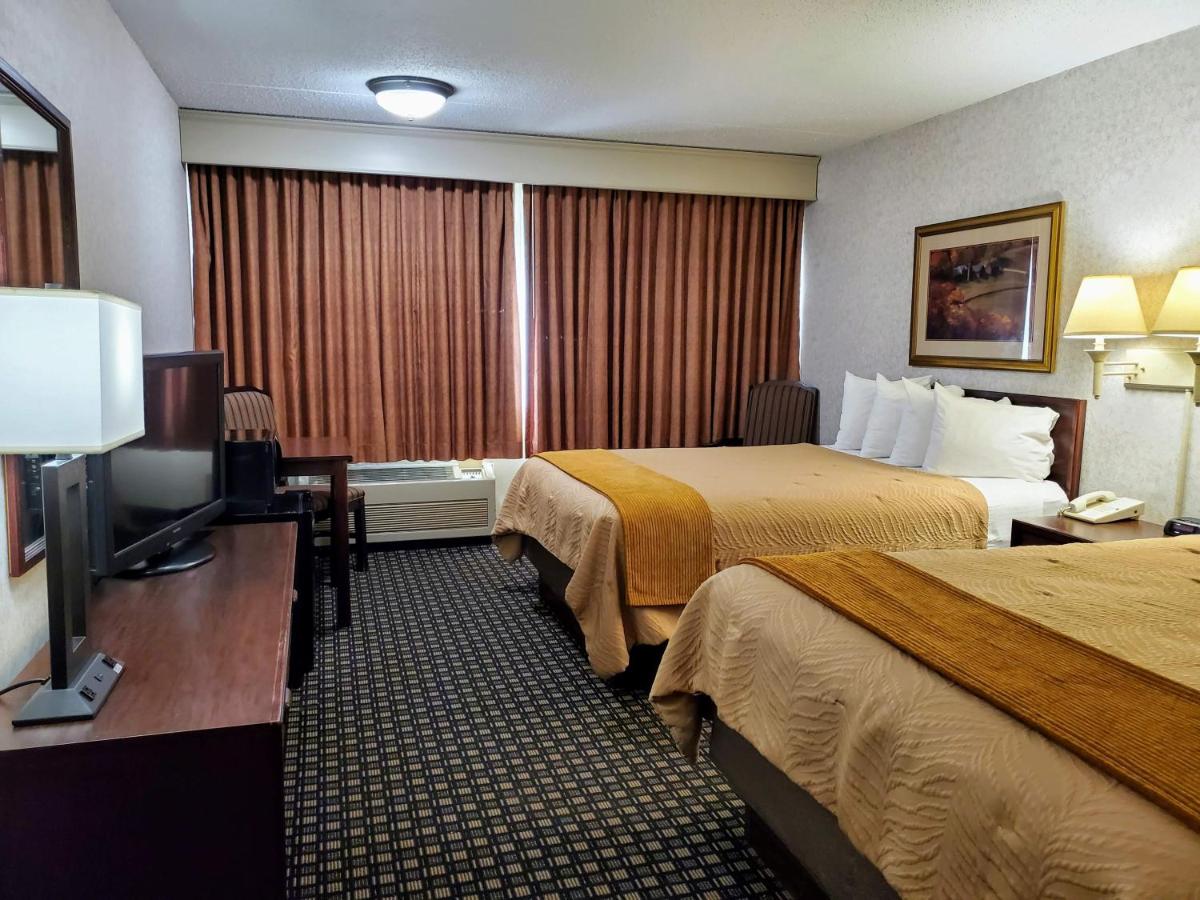 Queen Room with Two Queen Beds at AmericInn by Wyndham Watertown