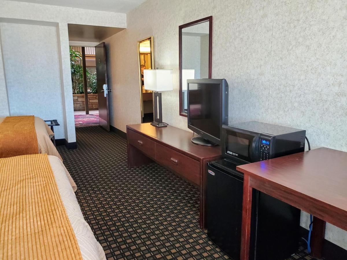 Queen Room with Two Queen Beds at AmericInn by Wyndham Watertown