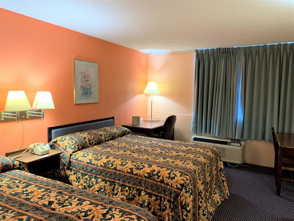 | Red Carpet Inn & Suites