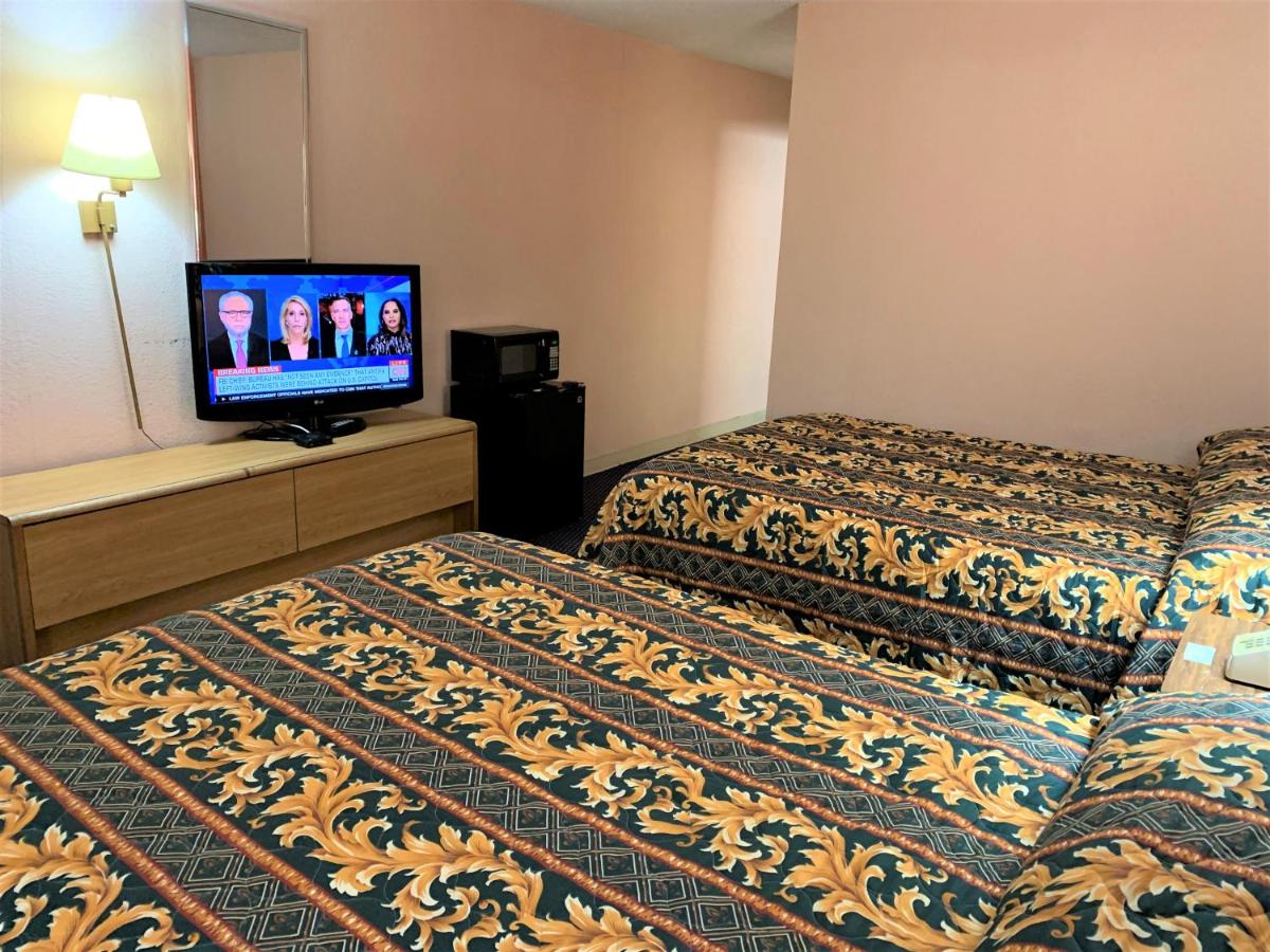 | Red Carpet Inn & Suites