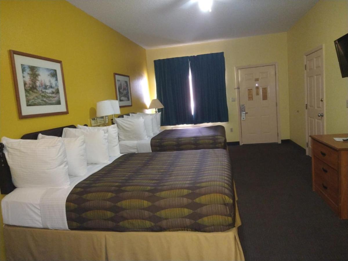 Queen Room with Two Queen Beds - Smoking at SureStay Hotel By Best Western Mission
