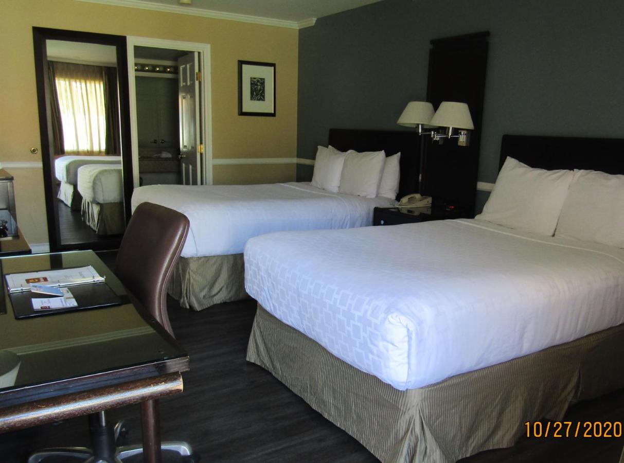 Queen Room with Two Queen Beds and Roll in Shower - Accessible/Non-Smoking at Clarion Inn Near China Lake Naval Station
