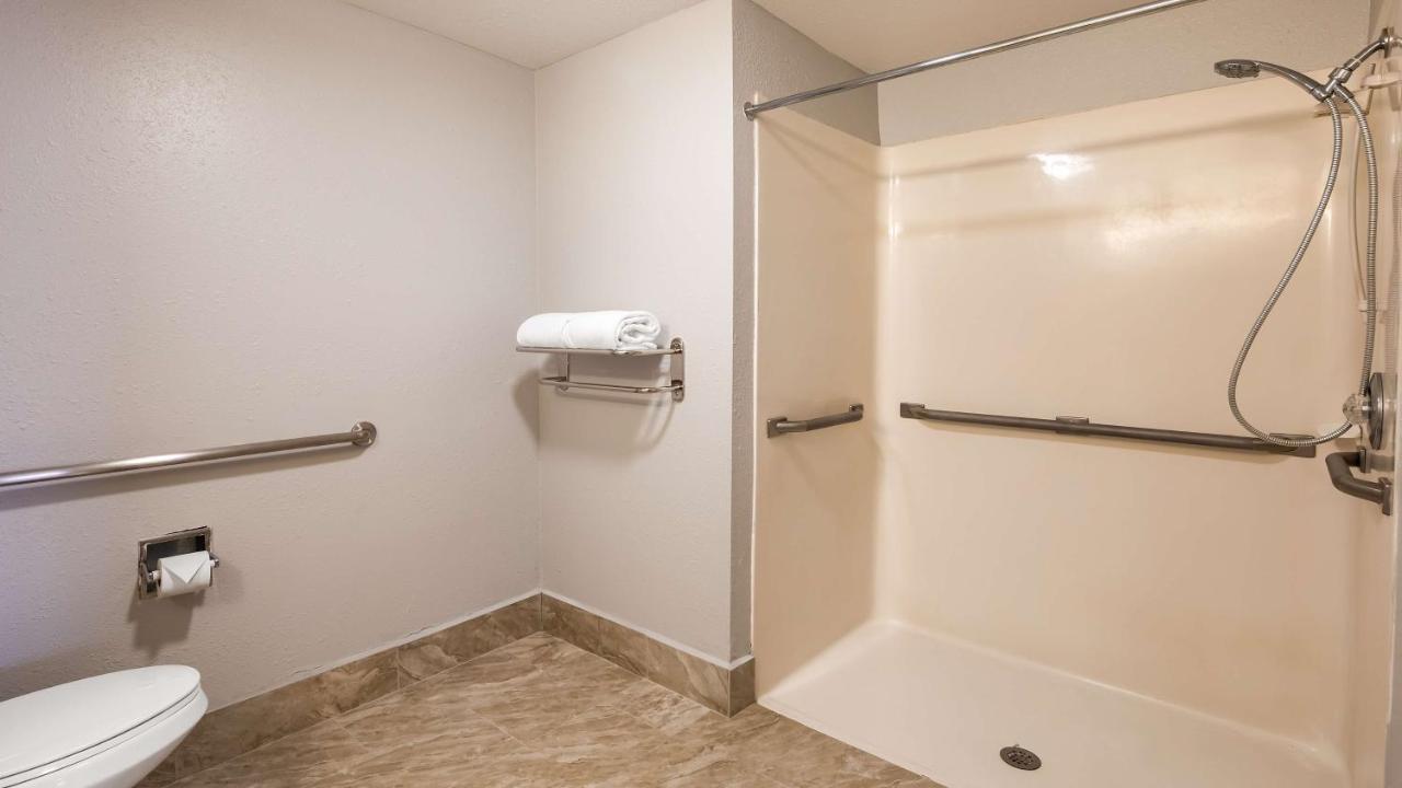King Suite with Mobility Accessible Roll-In Shower at SureStay Plus Hotel by Best Western Hammond