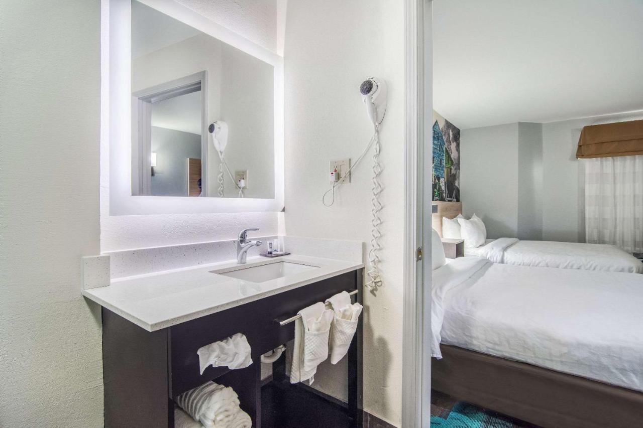 Queen Room with Two Queen Beds - Non-Smoking at Clarion Pointe Wake Forest - Raleigh North