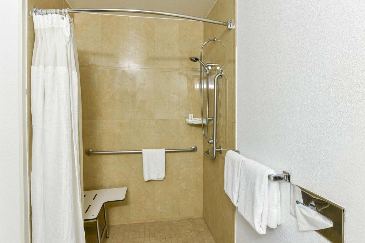 King Room with Roll-In Shower - Disability Access at SureStay Hotel by Best Western Ontario Airport
