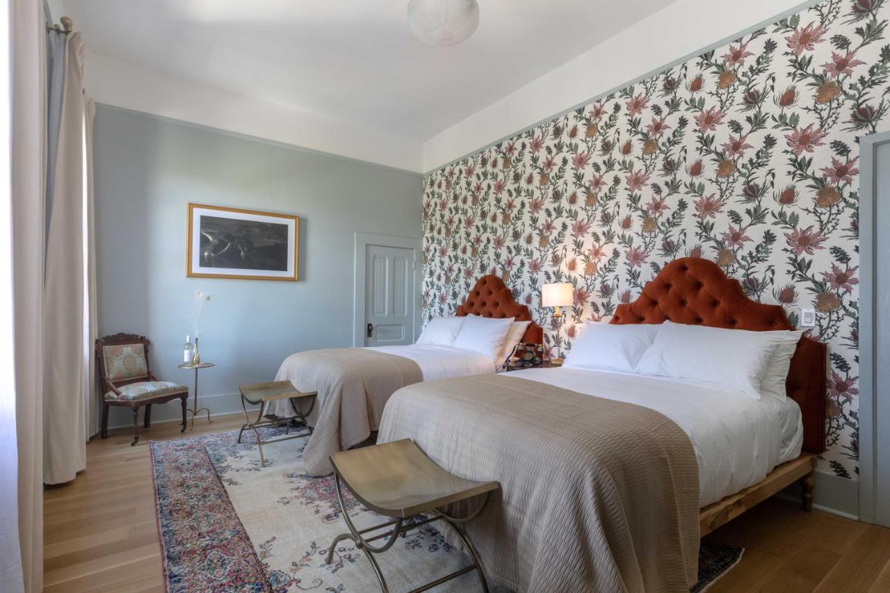 Deluxe Queen Room with Two Queen Beds at National Exchange Hotel