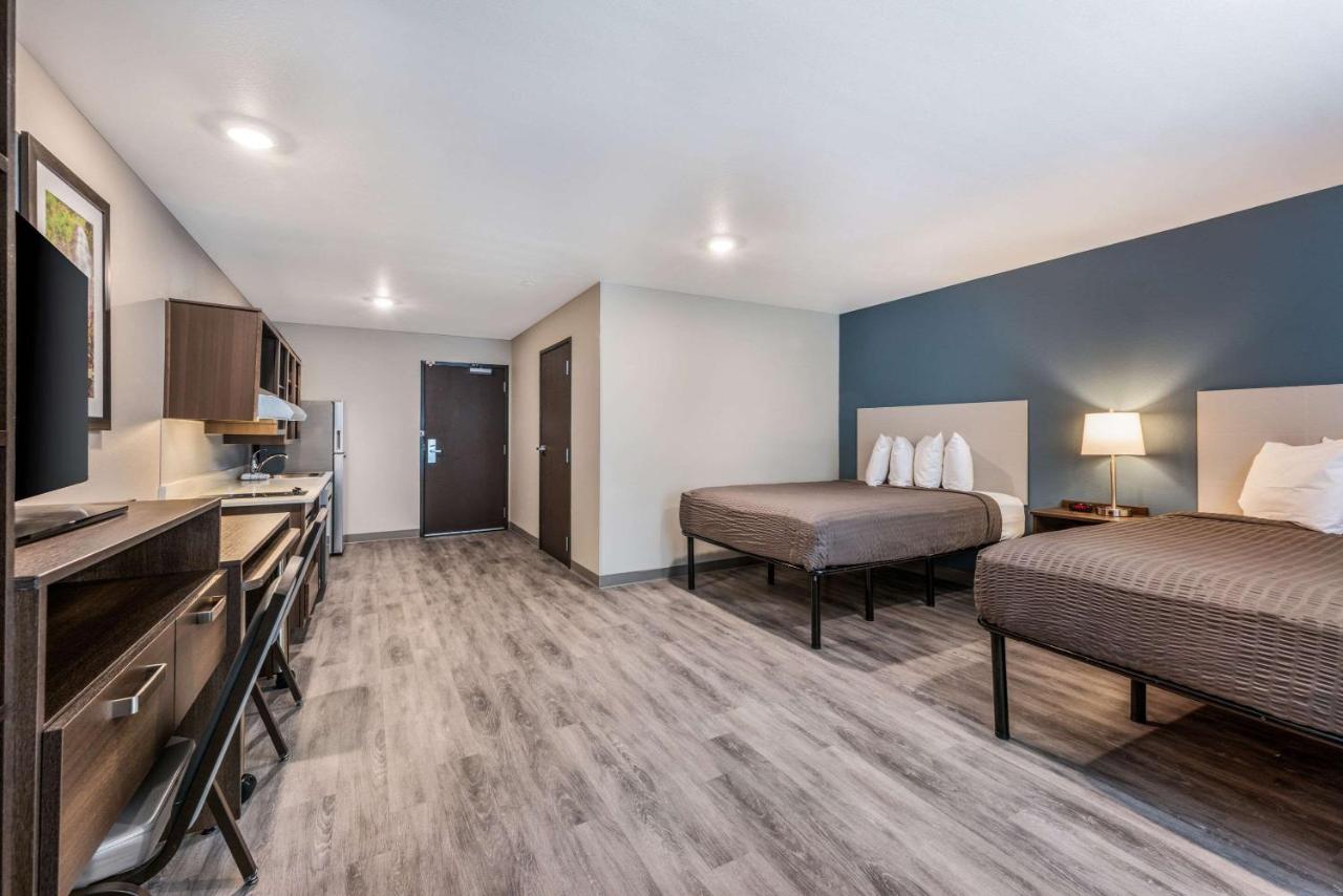 Queen Room with Two Queen Beds - Accessible/Non-Smoking at WoodSpring Suites Linden