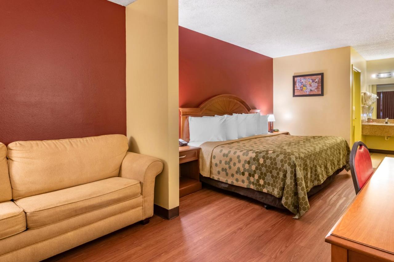 King Suite with Sofa Bed - Non-Smoking at Econo Lodge Inn & Suites Maingate Central