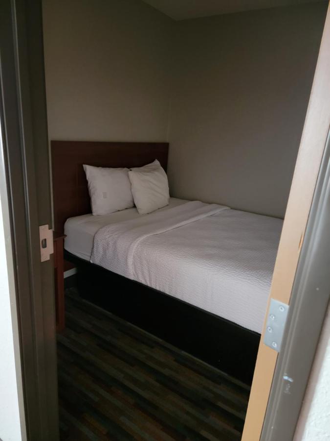 Queen Room with Three Queen Beds - Non-Smoking at Days Inn by Wyndham Tucumcari