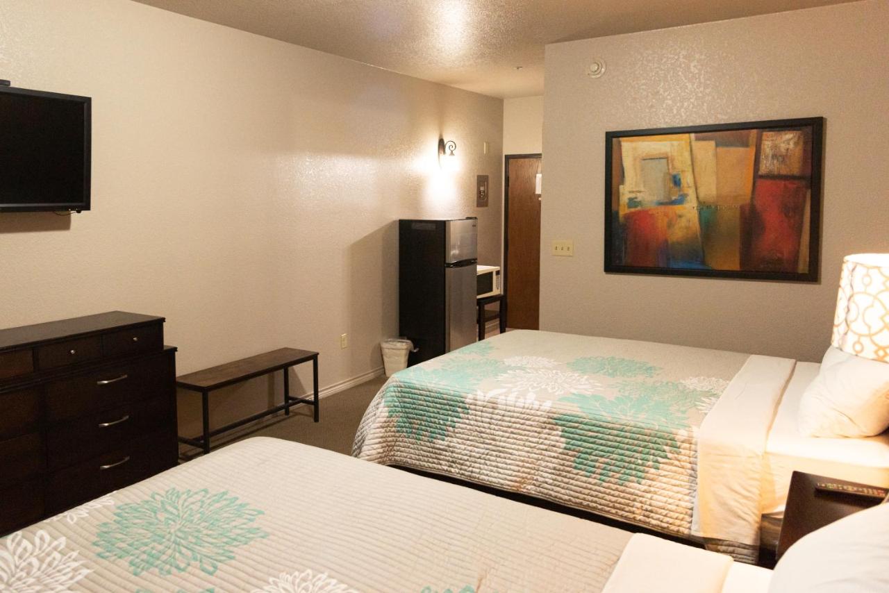 Deluxe Queen Room with Two Queen Beds at Premium Inn and Suites