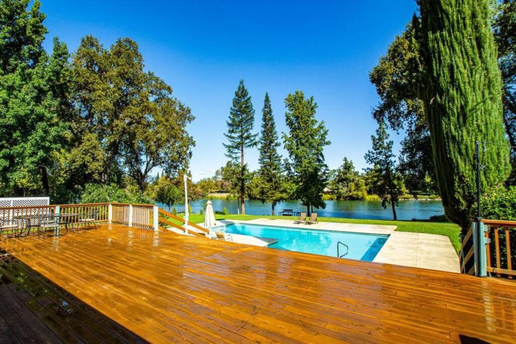 | Luxury Riverside Estate - 3BR Home or 1BR Cottage or BOTH - Sleeps 14 - Swim, fish, relax, refresh